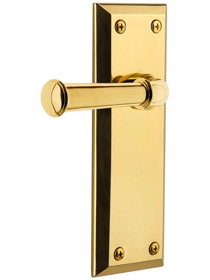 Grandeur Fifth-Avenue Door Set with Georgetown Levers in Polished Brass.